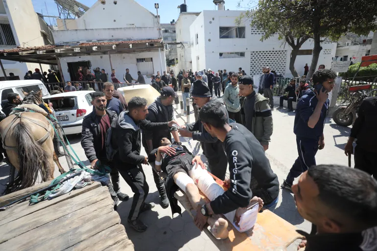 AA-20240323-34075405-34075391-ISRAEL_HITS_PALESTINIANS_WAITING_FOR_HUMANITARIAN_AID_IN_GAZA-1711204923