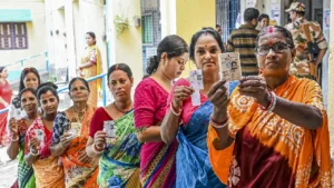 voters-show-their-id-cards-as-they-wait-to-cast-their-votes-during-ranaghat-south-assembly-by-poll
