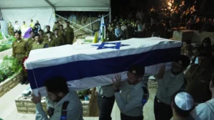 Just-released-hostage-attends-funeral-of-fellow-soldier-as-few-bodies-returned-from-Gaza-768x432