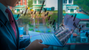 Businessman, Laptop, Stock Market Investment Graph