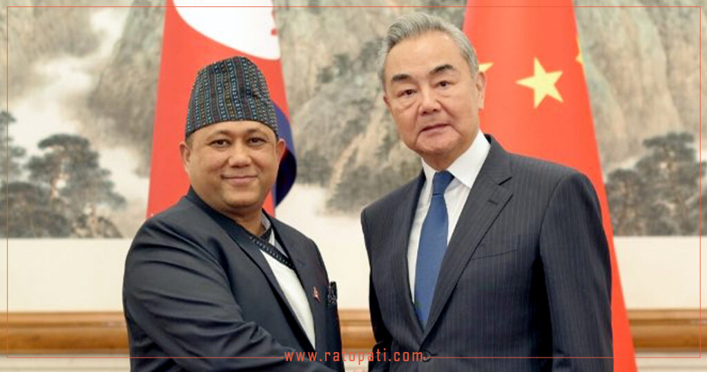 shishir-khanal-wang-yi_Yvld6ucDMG